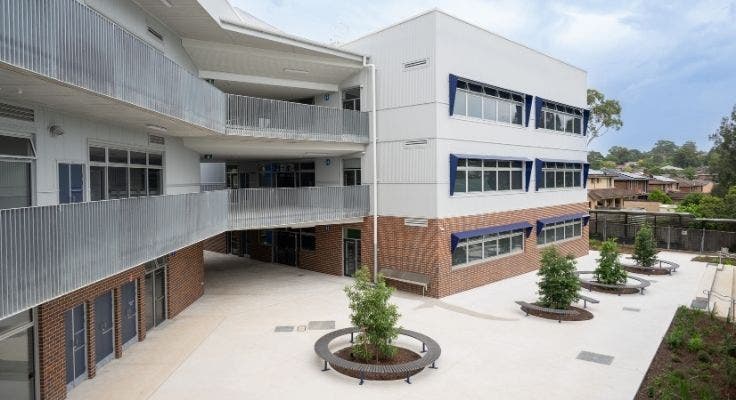 aerial shot of school building and courtyard