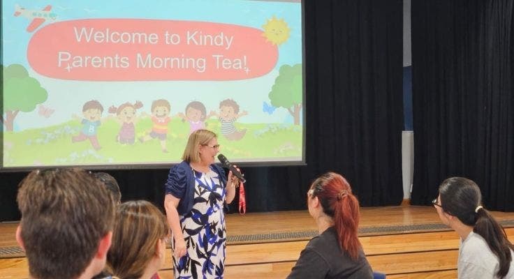 School Principal addressing parents at a Kindergarten morning tea