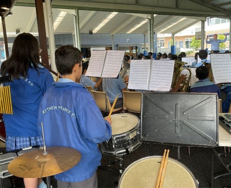 students in a school band with percussion instruments